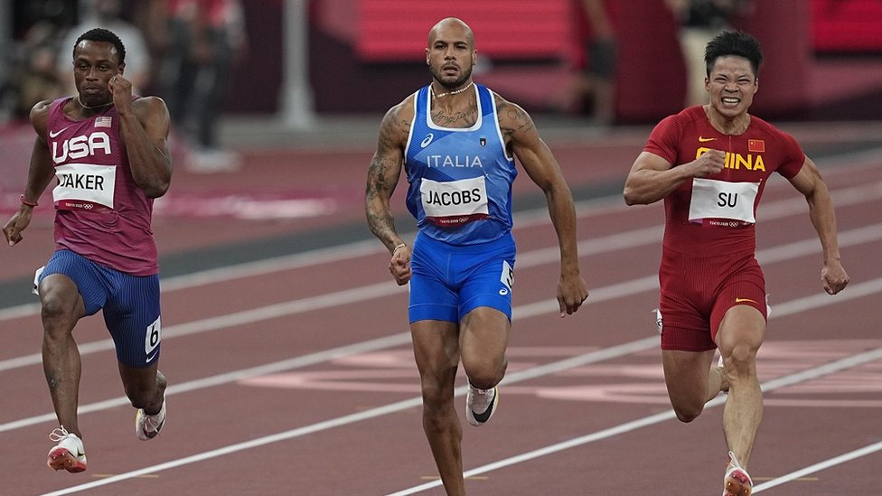 Lamont Marcell Jacobs and Bingtian Su during 100 meter for men at the Tokyo Olympics, Tokyo Olympic stadium, Tokyo, Japan on August 1, 2021.
