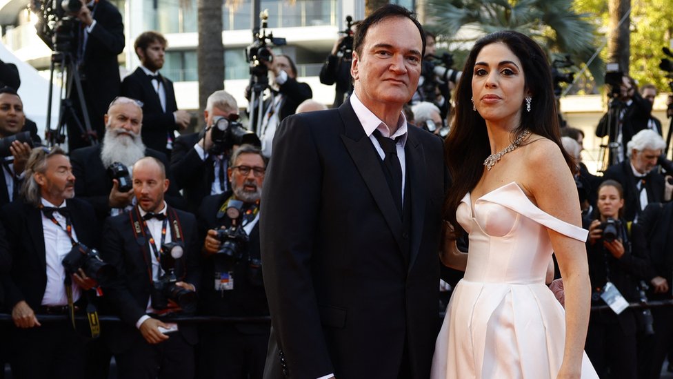 Quentin Tarantino and his wife Daniella Pick pose on the red carpet to attend the closing ceremony and the screening of the animated film "Elemental" Out of competition, during the 76th Cannes Film Festival in Cannes, France, May 27,