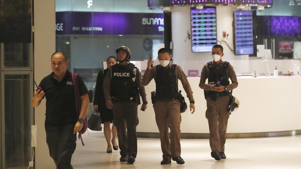 thai police officers secure Siam Paragon shopping centre in Bangkok on October 3, 2023, following a shooting incident in the mall.