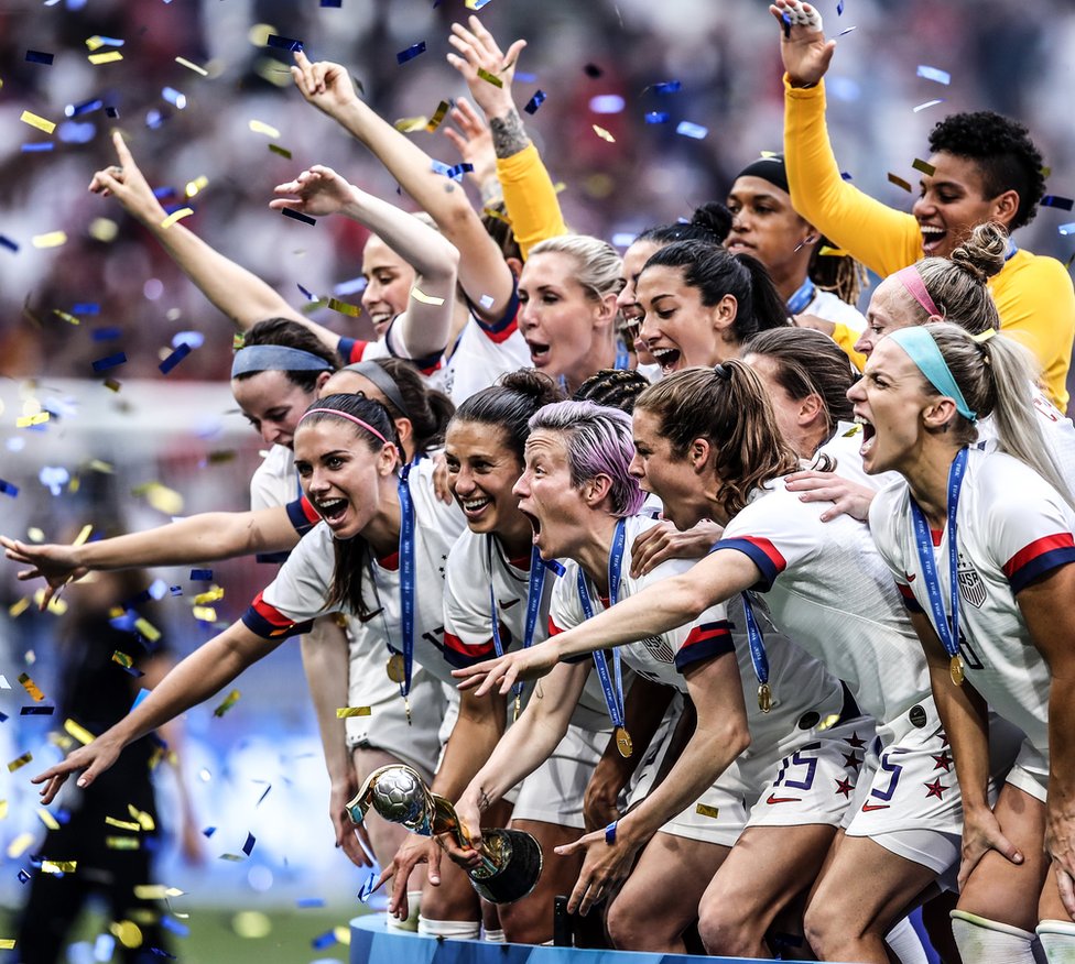 Megan Rapinoe of the USA lifts the Fifa Women's World Cup