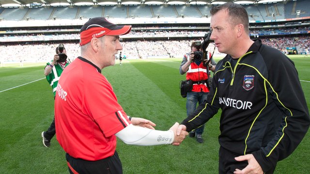 Tyrone manager Mickey Harte shakes hands with Sligo manager Niall Carew after the match in Croke Park