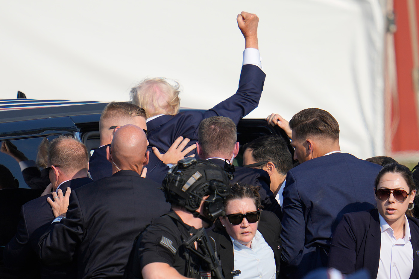 Bullets, blood and a raised fist: Dramatic images from Trump rally ...