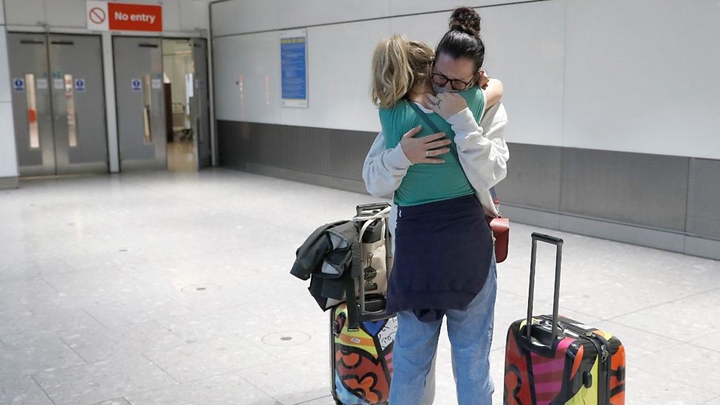 Hugs and tears at Heathrow as families reunite