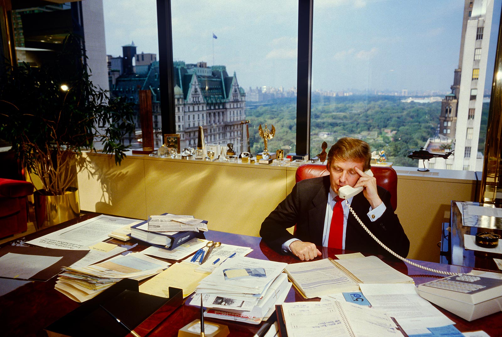 Donald Trump on the telephone at his desk in his office in Trump Tower in September 1987