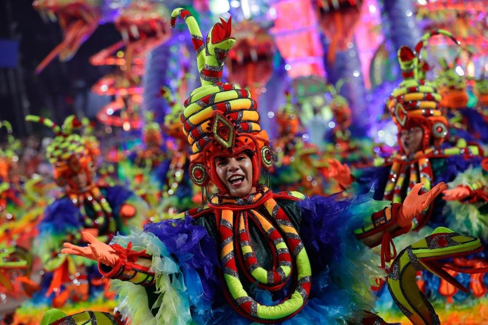 Members of the Unidos do Viradouro samba school parade during the second day of the Rio de Janeiro carnival at the Sambadrome in Rio de Janeiro, Brazil, 13 February 2024.