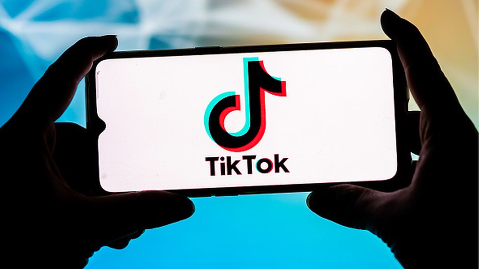 TikTok: Missing girl found after using viral call for help sign - BBC News