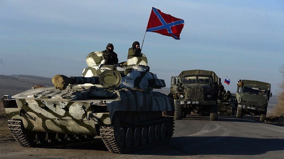 A convoy of Russian-backed rebels rolls near the eastern Ukrainian city of Starobeshevo in Donetsk region, on February 25, 2015