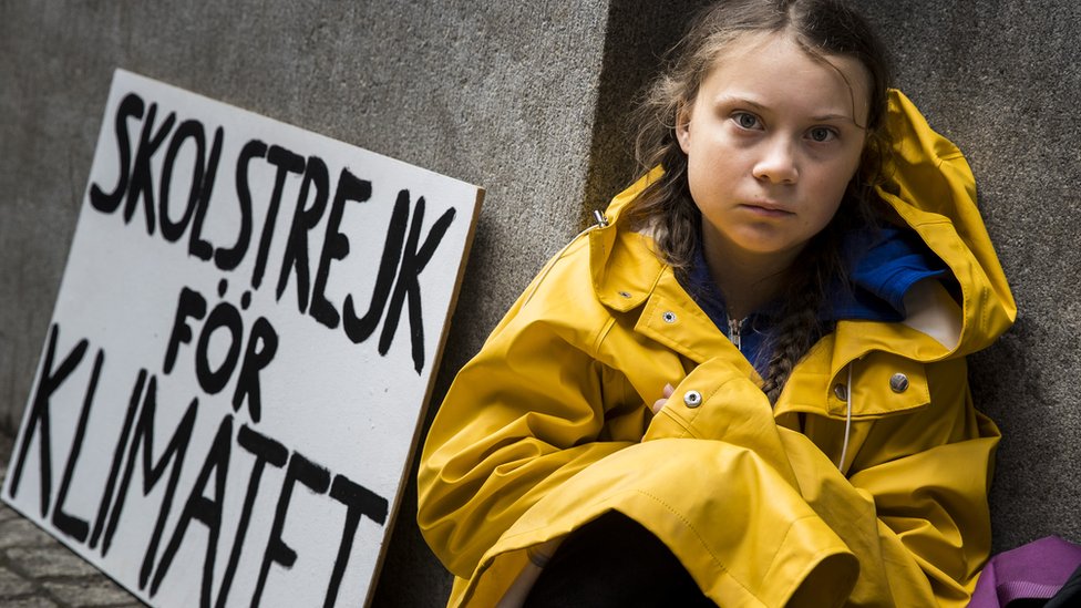 Fifteen year old Swedish student Greta Thunberg leads a school strike and sits outside of Riksdagen, the Swedish parliament building, in order to raises awareness for climate change on August 28, 2018 in Stockholm, Sweden.