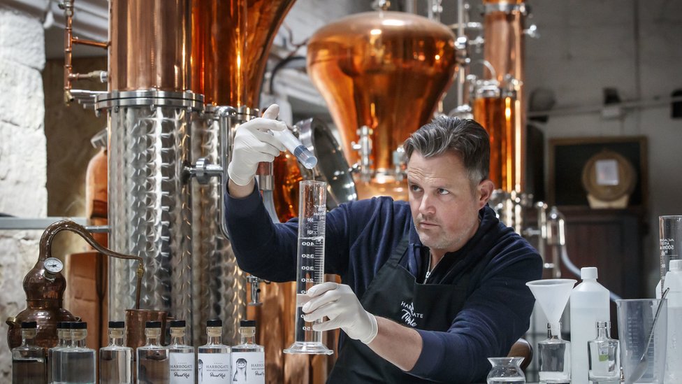 A gin distiller using his facilities to make hand sanitiser