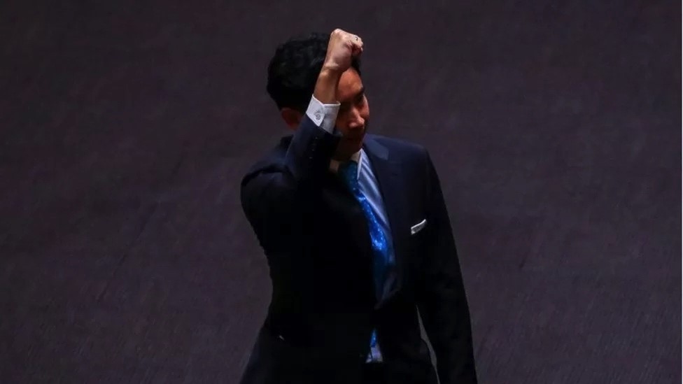 Pita Limjaroenrat, leader of the Move Forward Party gestures at parliament after Thailand"s Constitutional Court ordered his temporary suspension from the parliament, on the day of the second vote for a new prime minister, in Bangkok, Thailand, July 19, 2023.