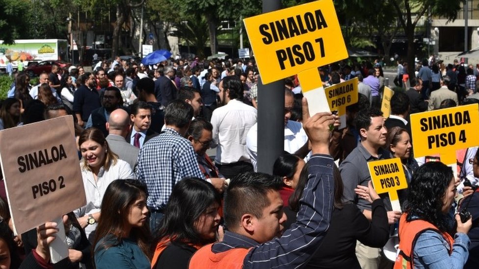 People take part in earthquake training in Mexico City