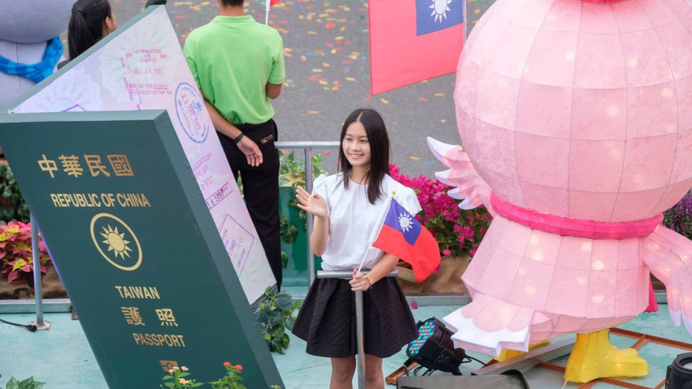 2018/10/10: A young woman standing on a float during the celebration of the 107 birthday of the Republic of China in Taipei, Taiwan, known also as double Ten celebrations.