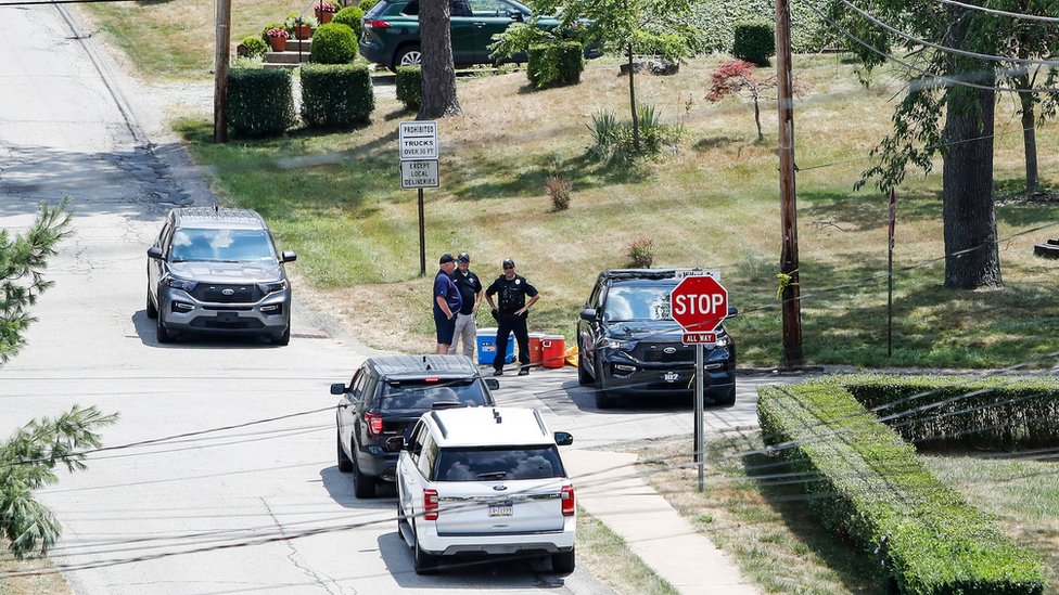 Law enforcement officials near the home of 20-year-old Thomas Matthew Crooks, identified by the Federal Bureau of Investigation as the person who attempted to assassinate former President Donald J. Trump, during an investigation in Bethel Park, Pennsylvania, USA, 14 July 2024. Crooks was killed by police after shooting and injuring Trump during a rally in Butler, Pennsylvania on 13 July.