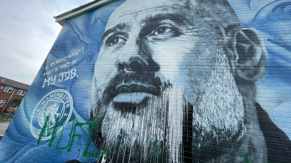 Defaced UK soccer star mural transformed into symbol of anti