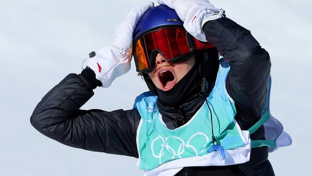 Gu reacts to landing a 1620 in the Winter Olympic ski big air final