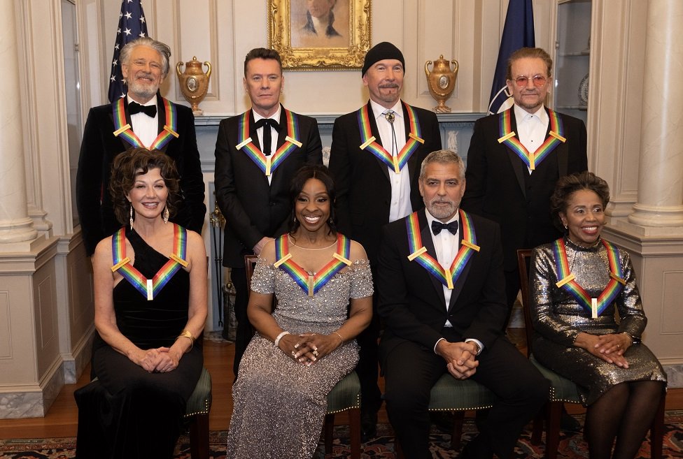 U2's Adam Clayton, Larry Mullen Jr, The Edge and Bono; along with Amy Grant, Gladys Knight, George Clooney and Talia Leon