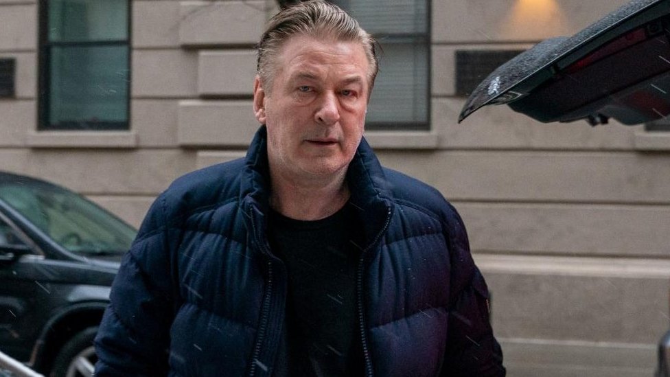 Alec Baldwin leaving his home in New York on Tuesday, hours before he was charged with involuntary manslaughter in New Mexico.