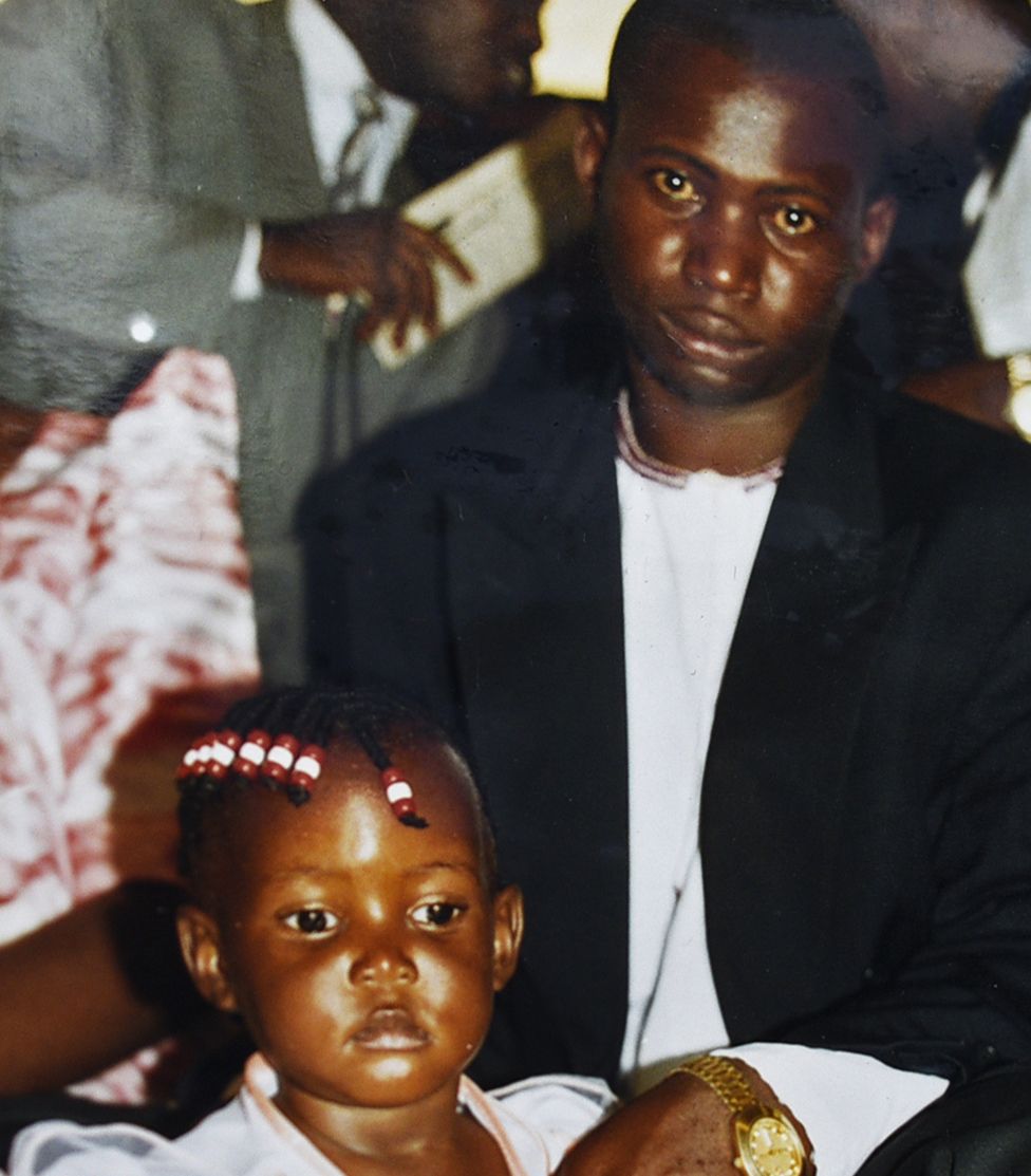 Constantine Sseremba y su hija