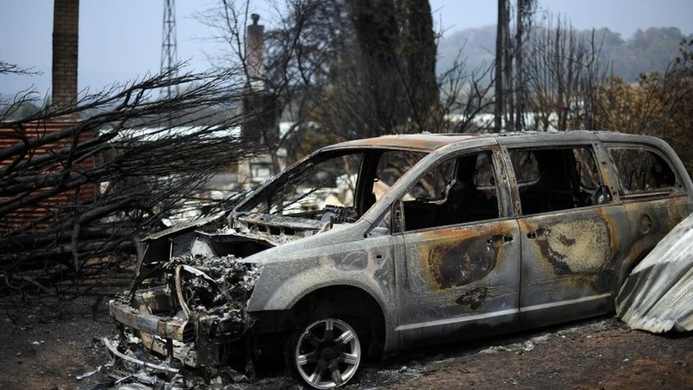 A burnt-out car from a bushfire in New South Wales