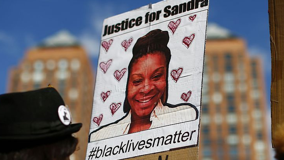 Placard with Sandra Bland's face