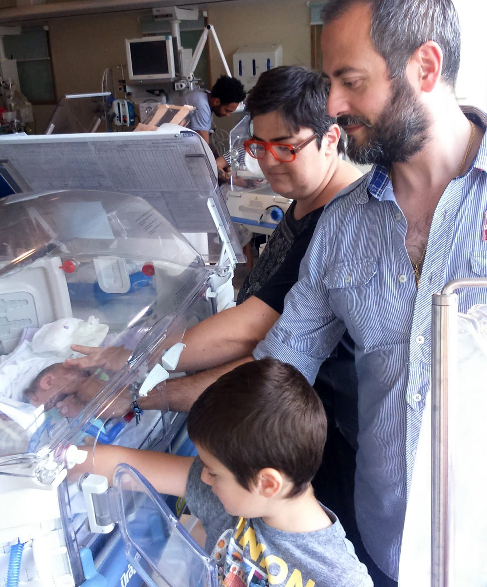 Valentina Daprile , husband Luigi, and son Leone, with Angelo Ray in the incubator