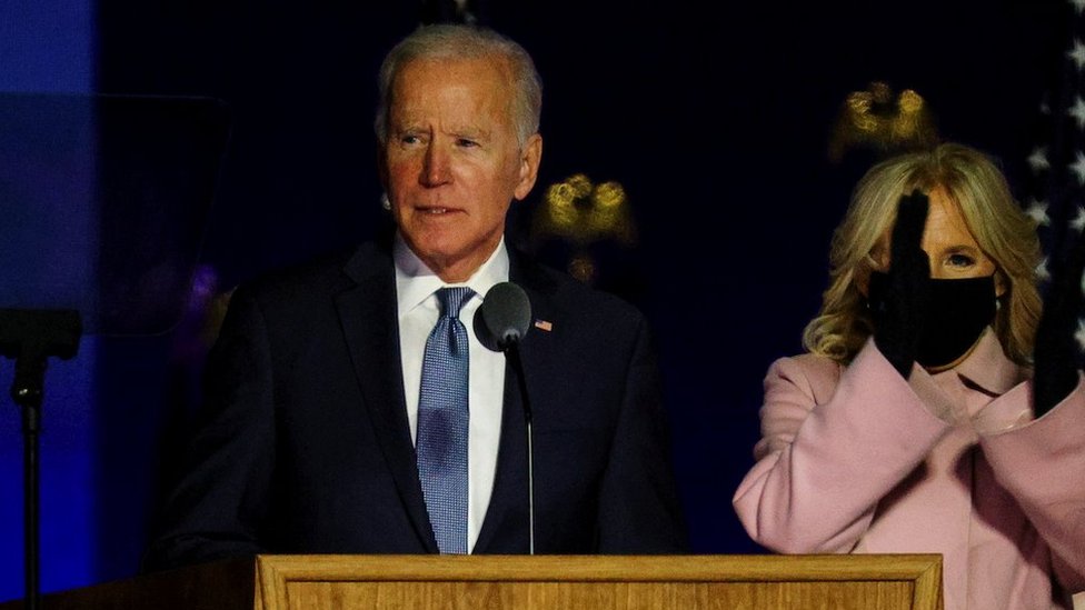 U.S. Democratic presidential nominee and former Vice President Joe Biden accompanied by his wife Jill, delivers remarks after early results from the 2020 U.S. presidential election in Wilmington, Delaware, U.S., November 4, 2020.