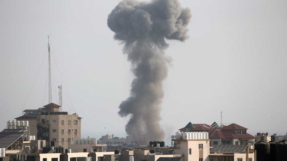 Smoke rises following an Israeli air strike, amid Israeli-Palestinian fighting, in Gaza, May 20, 2021.