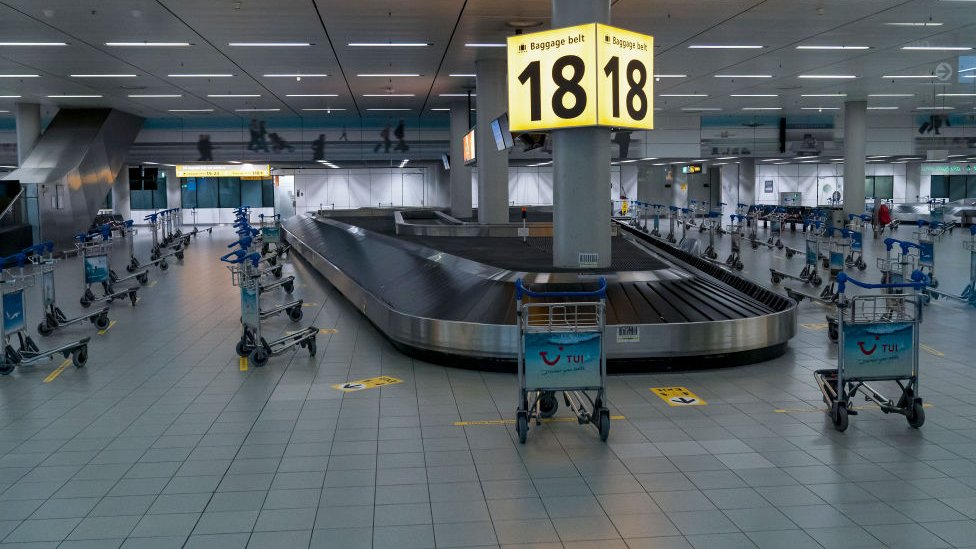 An empty baggage reclaim area at Schiphol International Airport in Amsterdam