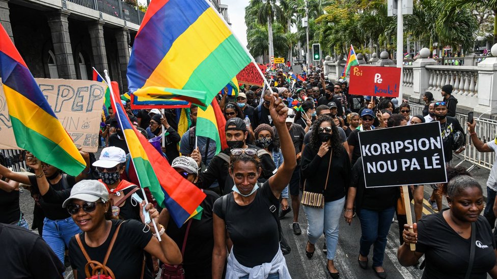Protesters march against the government's response to the oil spill disaster that happened in early August in front of Prime Minister's Office in Port Louis, on the island of Mauritius, on August 29, 2020.
