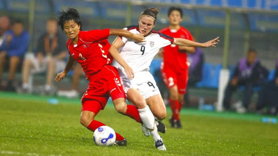 O'Reilly (right) competes for the ball during the United States' 2-2 draw with North Korea at the 2007 Women's World cup