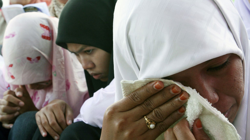 Mujeres en Indonesia tras el tsunami de 2004