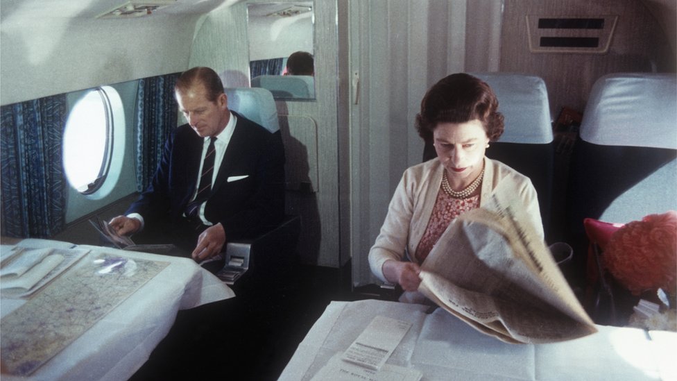 Prince Philip and the Queen on board a plane