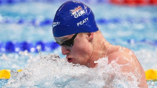 Britain's Adam Peaty breaks the 50m breaststroke world record at the World Swimming Championships in Kazan, Russia