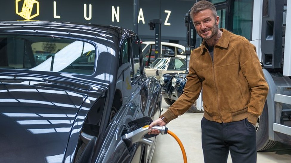 David Beckham charging a Rolls-Royce Lunaz electrified car