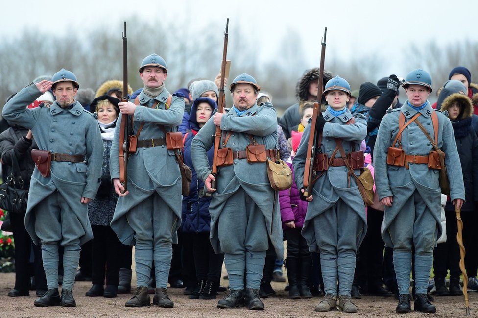 Members of military history clubs wear WWI French military uniform