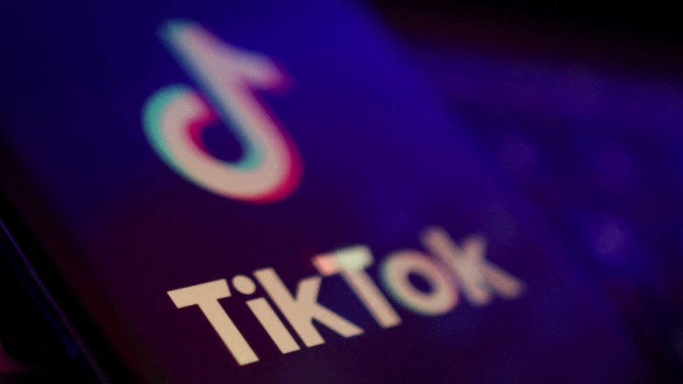 TikTok logo on a phone