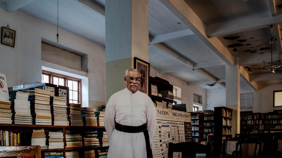 Father Francis cut-out at library