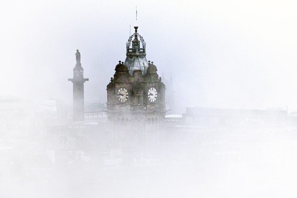 Fog surrounds the Balmoral Clock in Edinburgh