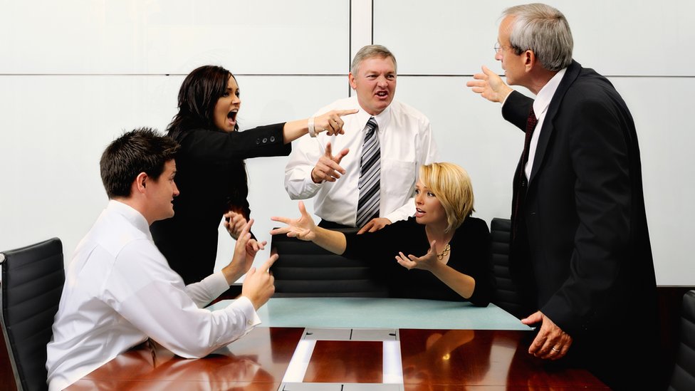 People arguing in an office