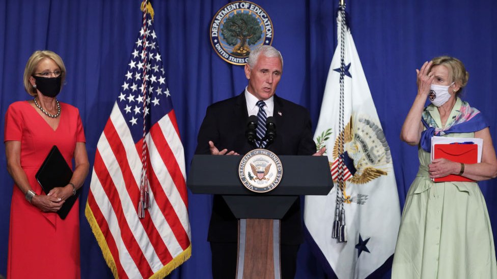 Mr Pence speaks alongside health and education officials