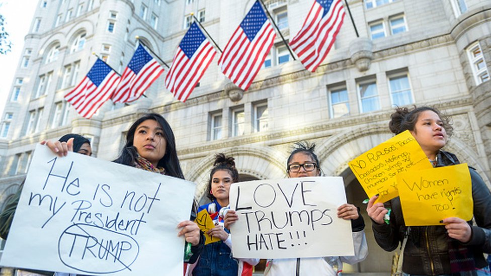 Protesters outside the Trump International Hotel in Washington DC