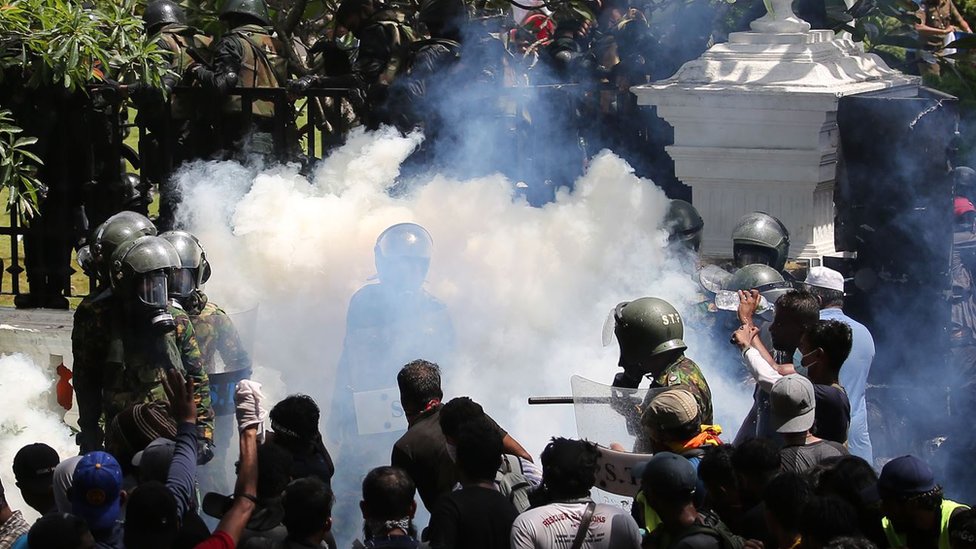 Anti-government protesters demonstrate outside the president's office in Colombo, Sri Lanka, on Wednesday