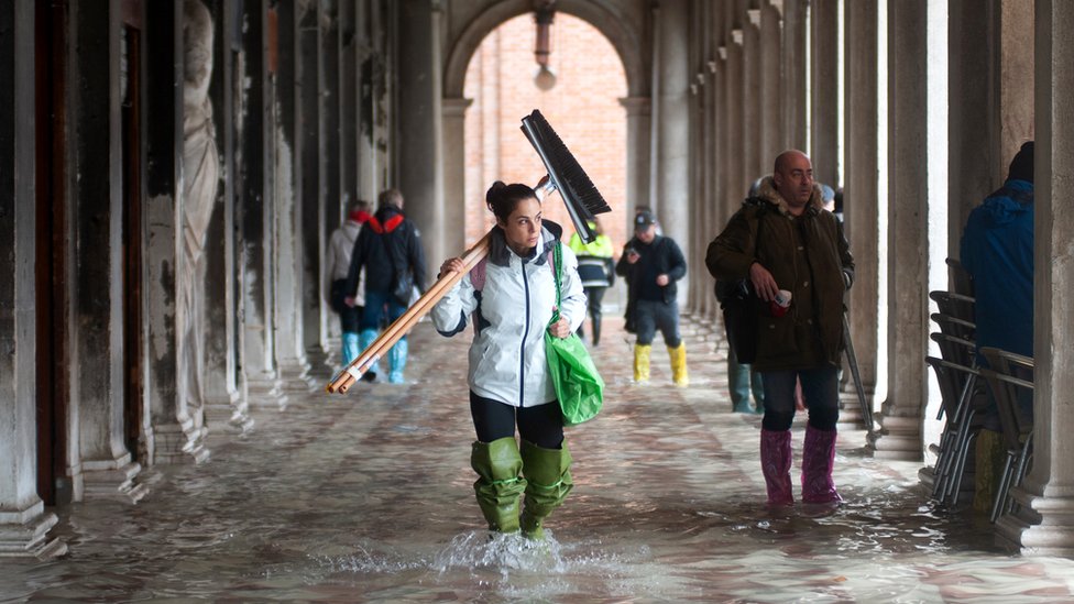 St Mark's Square in Venice is flooded in water during an exceptional high tide, 13 November 2019