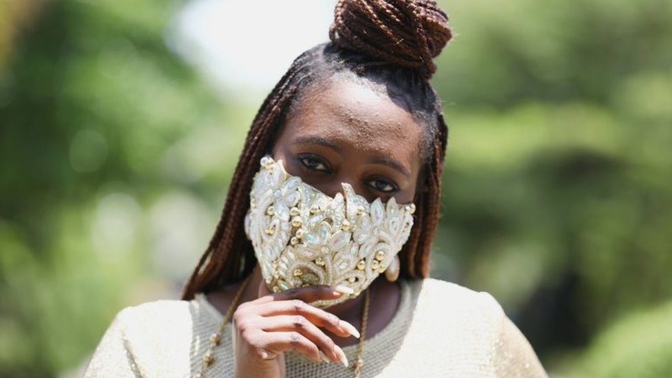 Sefiya Sjejomaoh wears a diamante face mask