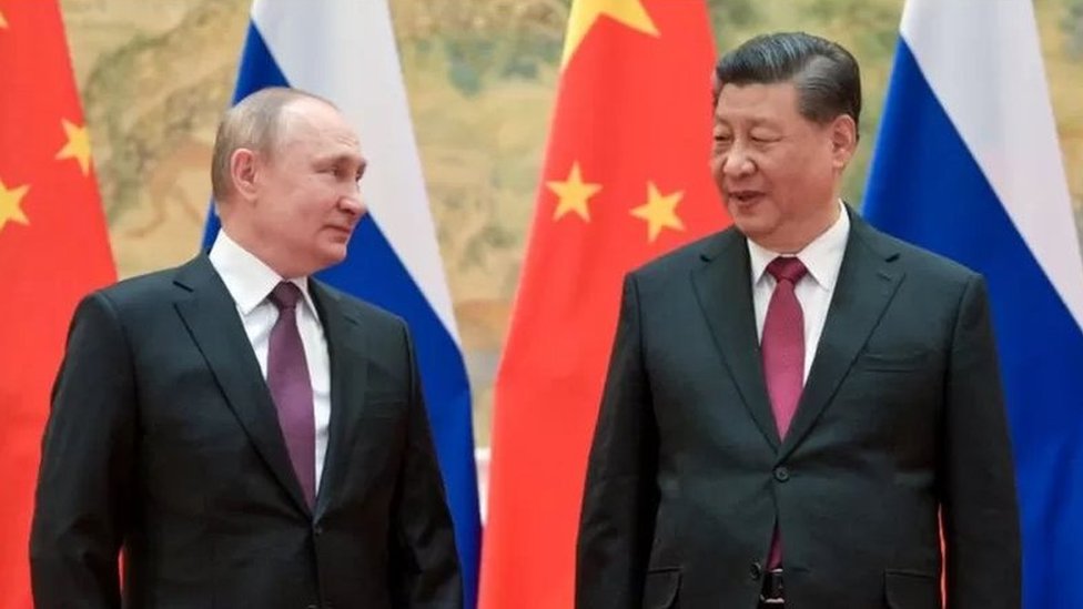 Putin dan Xi Jinping dalam pertemuan di Beijing.