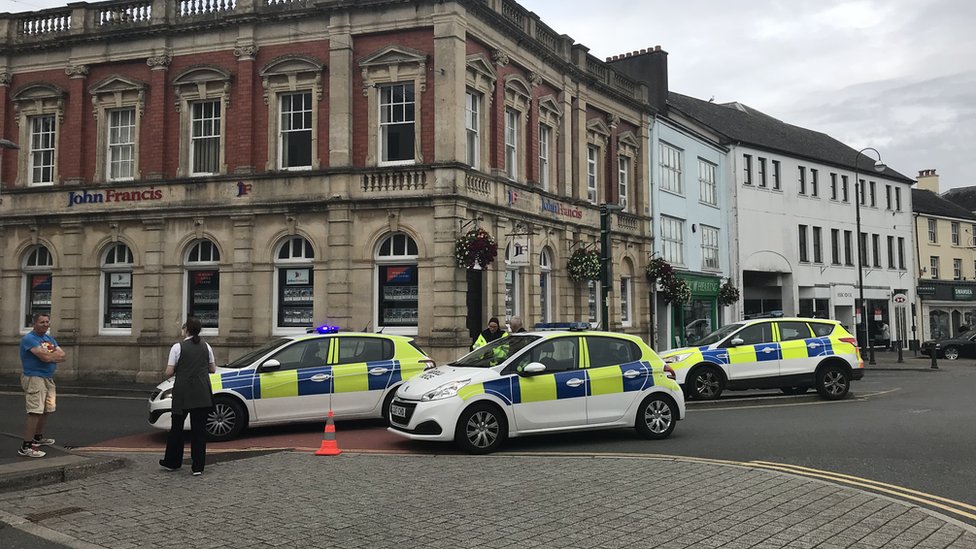 Two charged after Carmarthen police stand-off - BBC News