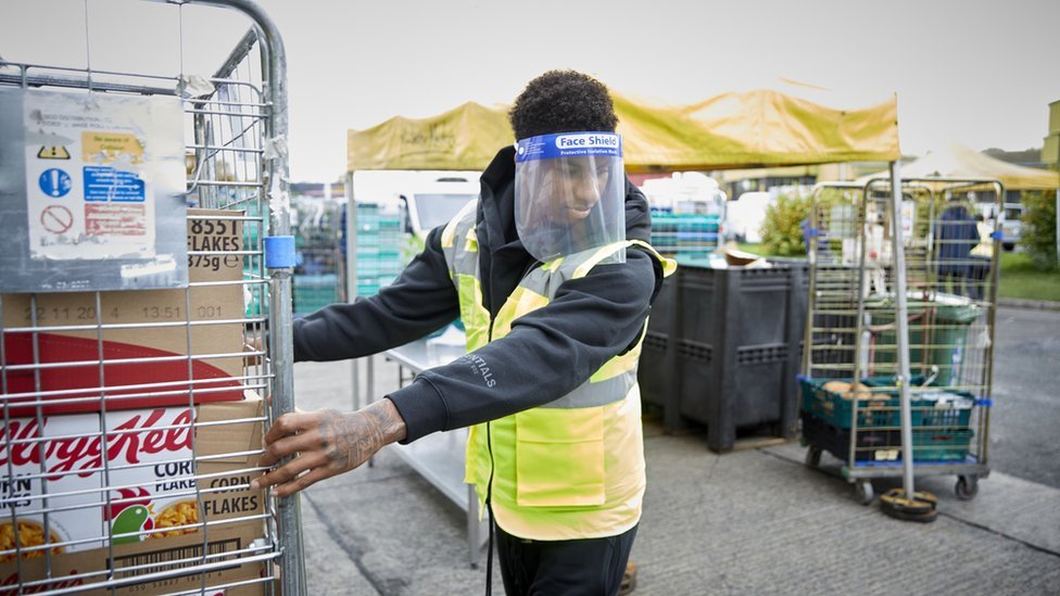 Marcus Rashford helps out at a food bank