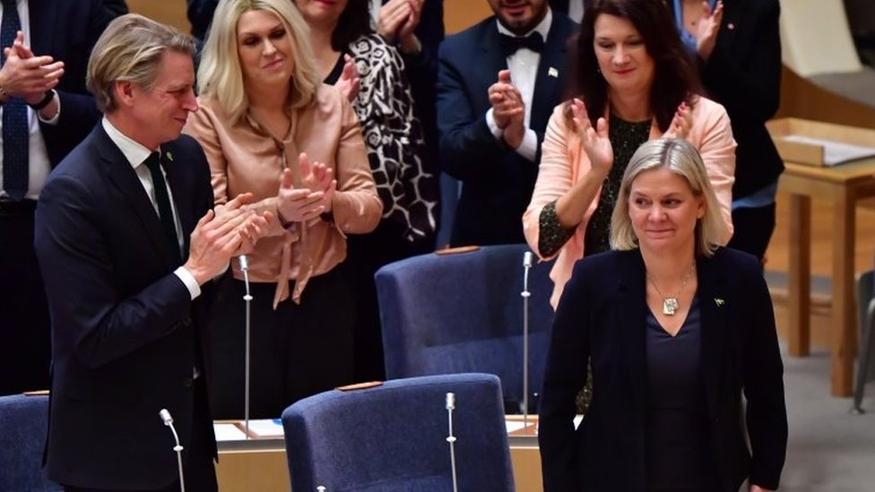 Magdalena Andersson is applauded by MPs