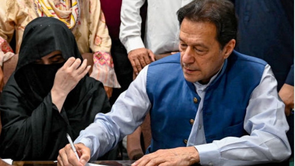 Imran Khan and his wife Bushra Bibi sign surety bonds for bail in July 2023