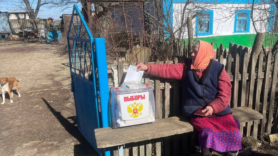 A woman votes in Kherson region